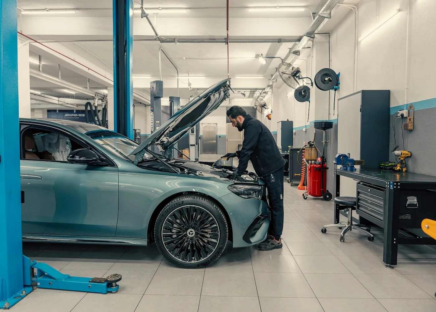 Illustrative auto service image; not a photo of Custom Exhaust and Brakes.