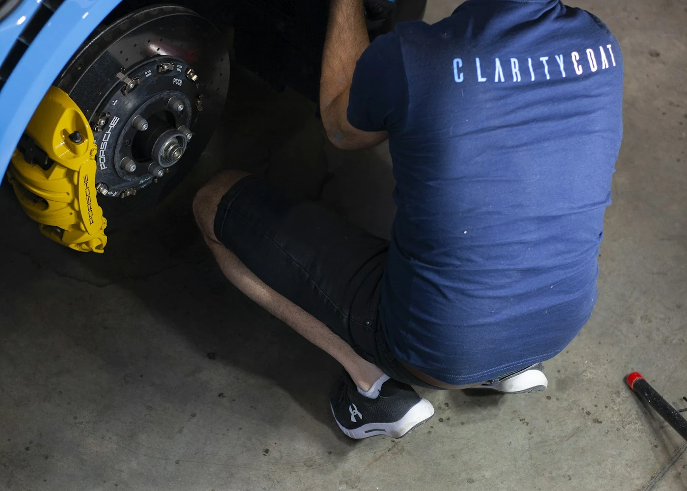 Illustrative car repair image; not a photo of The Organic Mechanic.